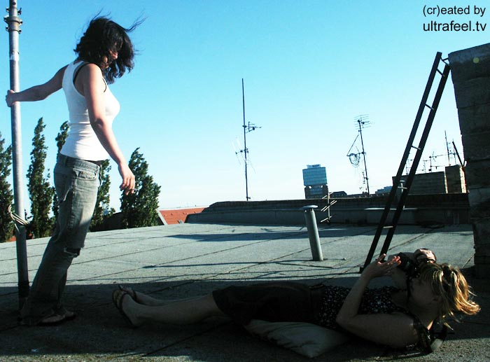 Women posing and photographing on a rooftop (c) h.r.fox @ ultrafeel.tv