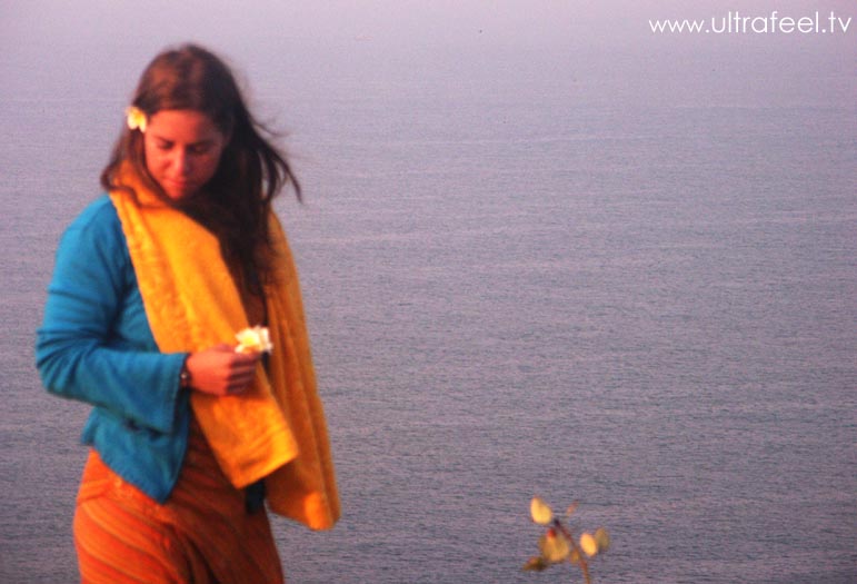 Girl with flower in front of Arambol sea, Goa